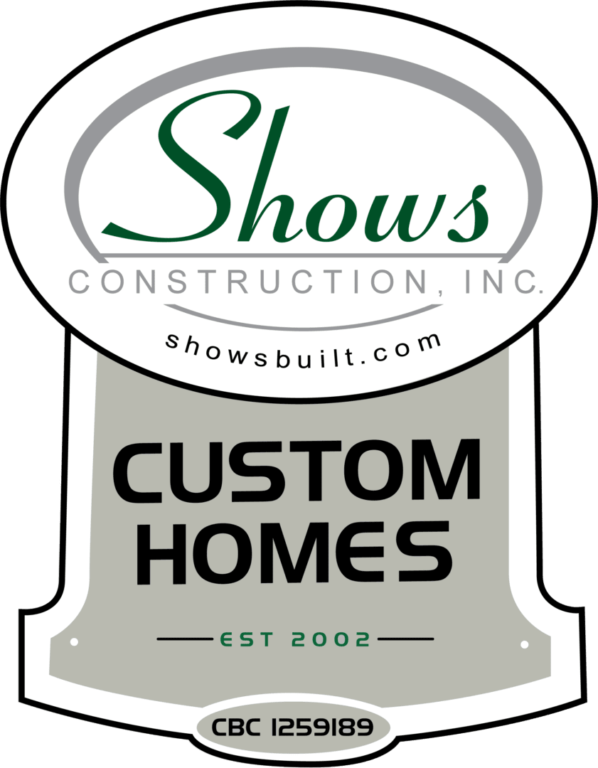 A green and white logo for shows construction.